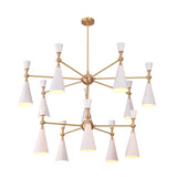 Large brushed brass cone chandelier detail showing decorative sphere accents, straight arms, and white painted cone shades