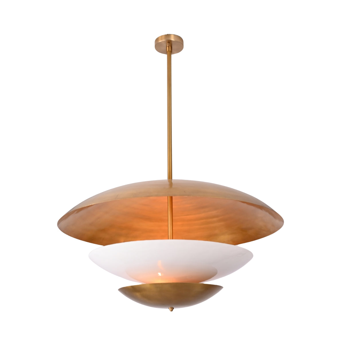 Large disc pendant light used as a living room statement fixture with warm ambient illumination and modern elegance
