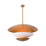 Large disc pendant light used as a living room statement fixture with warm ambient illumination and modern elegance