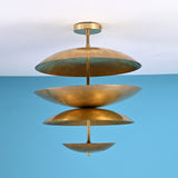 Layered disc brass flush mount ceiling light with sculpted bowl shades, handcrafted in solid brass for warm ambient indirect lighting.
