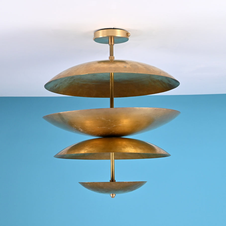 Layered disc brass flush mount ceiling light with sculpted bowl shades, handcrafted in solid brass for warm ambient indirect lighting.