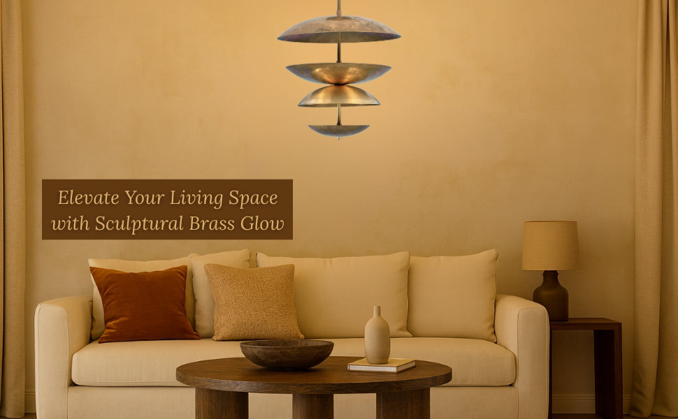 Brass chandelier with layered shades illuminating a cozy living room with neutral and earthy tones.