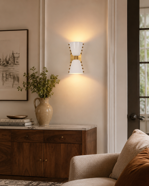 Luma Diabolo 2-light wall sconce shown in a styled living room with warm up and down wall glow