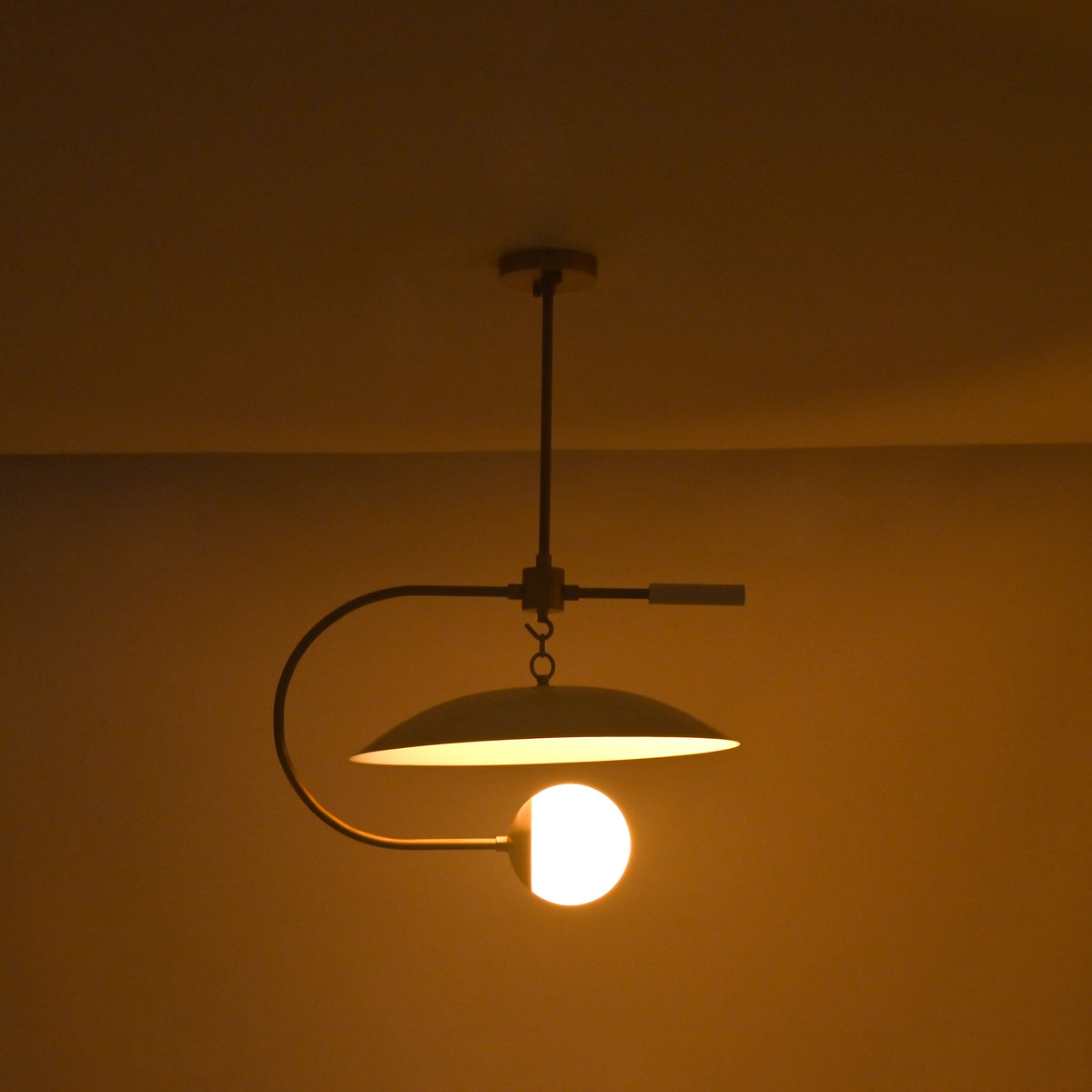 Luna Arc pendant light with 23 inch width and 32 inch height shown with dimension markings