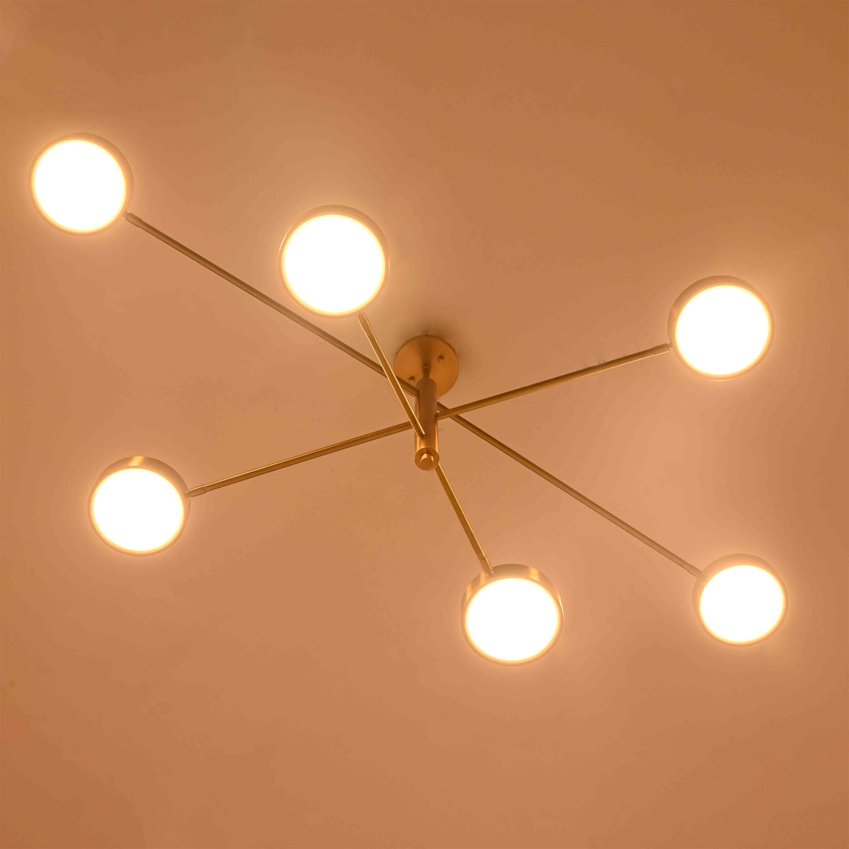 Luxury brass linear chandelier designed for living rooms, bedrooms, dining spaces, and boutique interiors