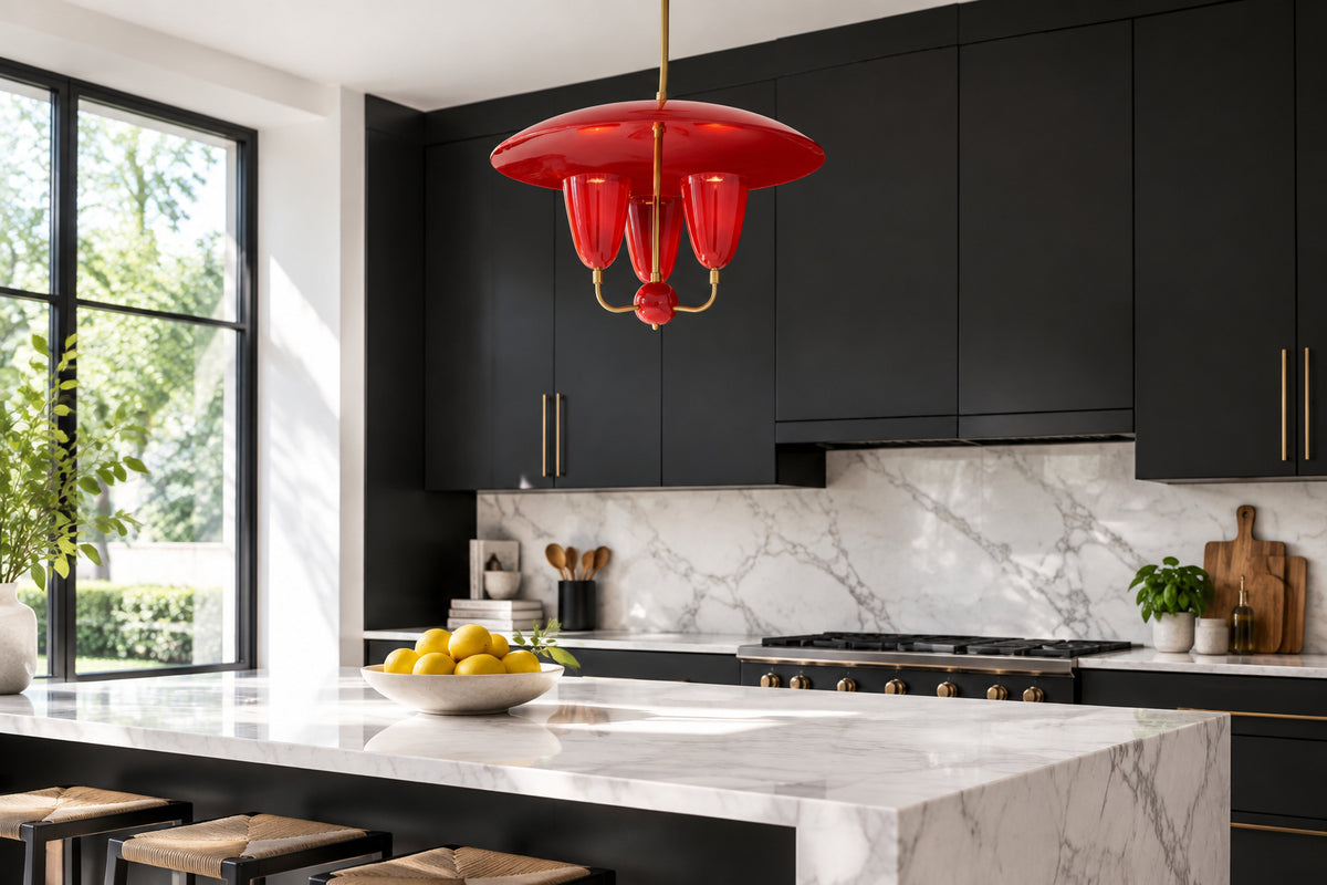 Mid century inspired brass chandelier with bold red enamel finish, wide shallow dome and three lower cup shades