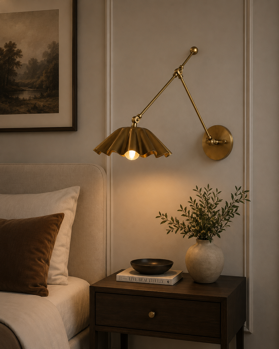 Marlow Pleated Brass Swing Arm Wall Sconce illuminated beside a bed in a warm modern bedroom, Model 32817