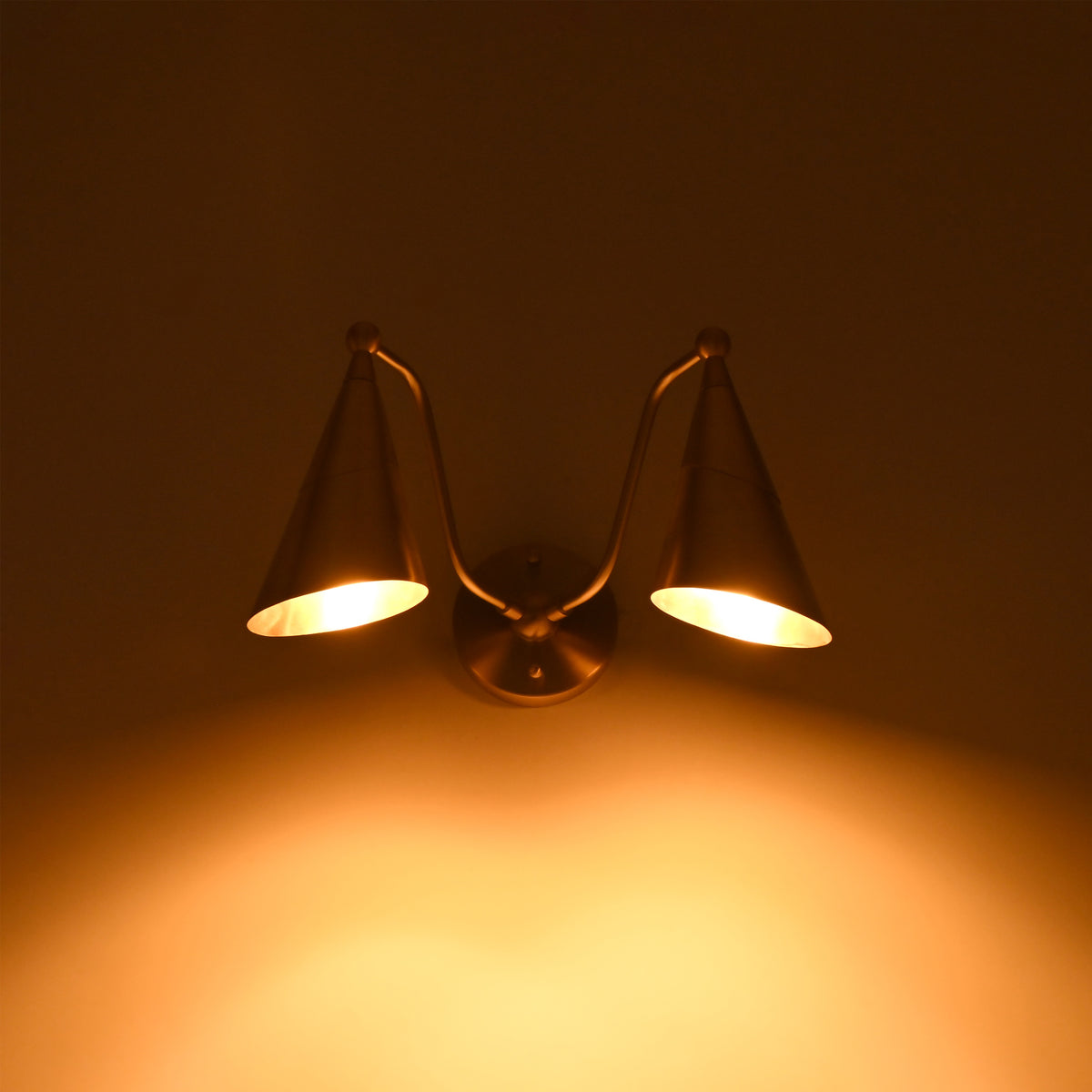 Mid century double cone wall sconce with brass finish and downward light effect for stylish interior wall lighting