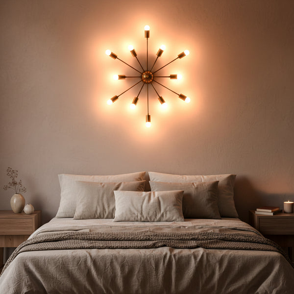 Mid century Sputnik brass wall light with exposed bulbs and sculptural radial arms for modern interior accent lighting