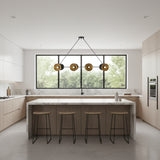 Milan 8 light linear chandelier with black double cone shades and warm brass interiors