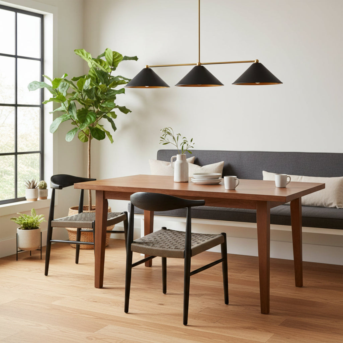 Milan 3 Light Linear Pendant Chandelier with black cone shades and brass frame angled view