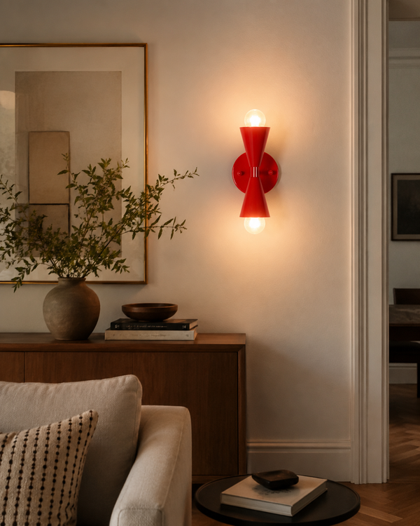 Milan Modern Double Cone Wall Sconce installed in a contemporary living room creating a bold decorative accent
