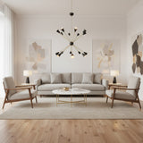 Milan Noir 16 light starburst chandelier featuring sculptural black cone shades and warm brass arms – angled view