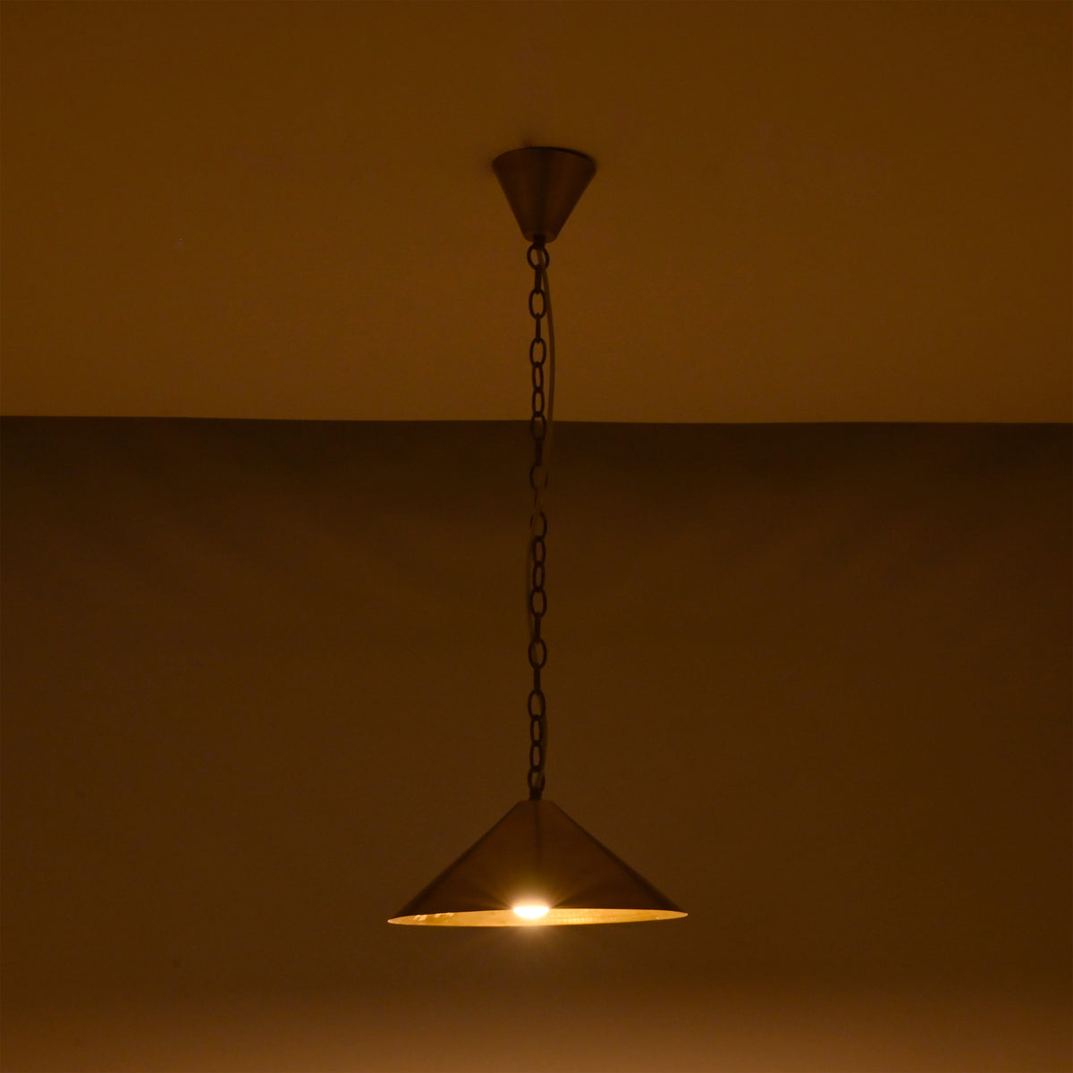 Minimal brass cone ceiling light with chain suspension designed for hallway, kitchen, dining, and bedroom spaces