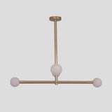 Minimalist brass linear chandelier with three frosted globe shades, modern handmade ceiling lamp.