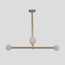 Minimalist brass linear chandelier with three frosted globe shades, modern handmade ceiling lamp.