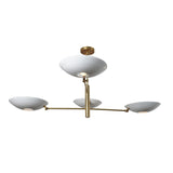 Handmade 4-light brass chandelier with sculptural bowl shades and refined geometric arrangement