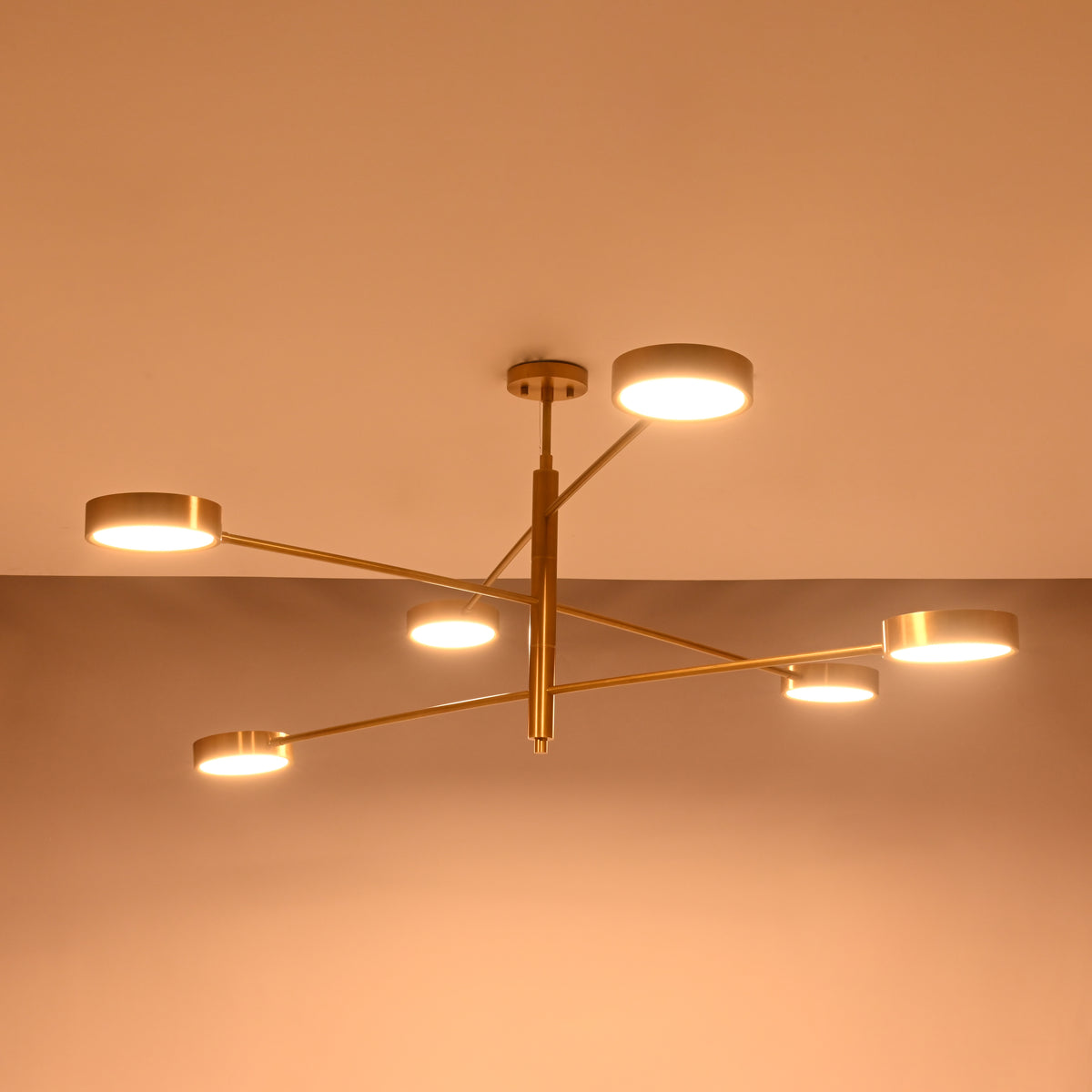 Modern 6-light disc ceiling fixture with slim brass rods and round illuminated heads for contemporary interiors