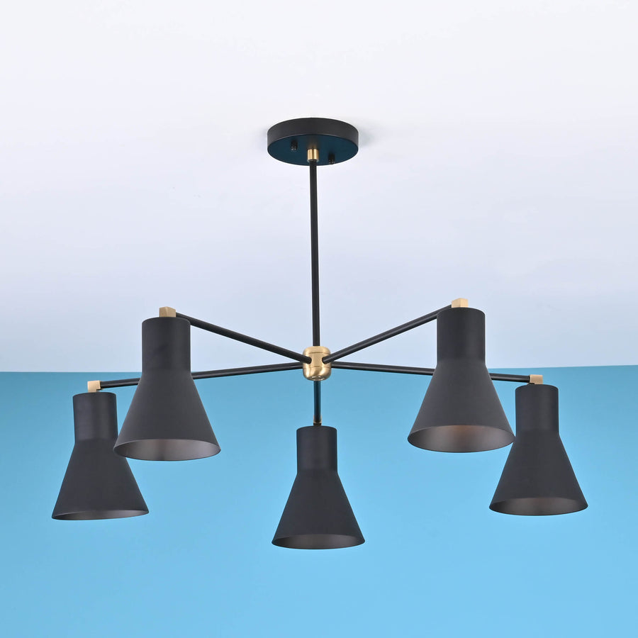 Modern 5 cone brass chandelier with black metal arms and minimalist industrial ceiling design