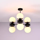 Modern brass disc chandelier with six opal glass globes, sculptural ceiling light by Brass Leaf Studio