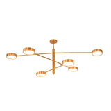 Modern brass disc light creating broad warm downward glow for stylish residential interiors