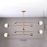 Modern brass globe chandelier shown from below with five opal glass shades and balanced linear arms