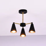 Angled view of modern cone brass ceiling light with balanced three arm configuration