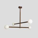 Industrial modern brass linear chandelier with four frosted globes, handmade custom ceiling light.