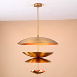 Front view of modern layered brass 6-light disc chandelier with sculptural floating bowl shades.