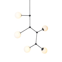 Modern molecular brass chandelier with five frosted glass globes and black metal frame by Brass Leaf Studio