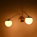 Modern two light globe wall sconce with soft ambient glow for living room, bedroom, and hallway décor