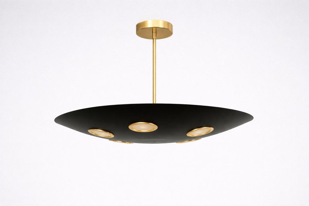 Modern disc-style brass chandelier with black bowl shade and brushed brass details, designed for minimalist and industrial interiors.