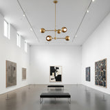 Orion Orbit 6 Light Brass Globe Chandelier with two-tier branching arms – straight view