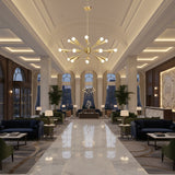 Orion Starburst 24 Light chandelier in warm brass finish with Mid-Century Modern design