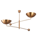 Oslo 2-light bowl chandelier creating warm upward ceiling glow with sculptural solid brass design