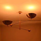 Oslo bowl chandelier dimension view showing 63 inch width, 33 inch height, and 15.5 inch bowl shades