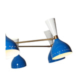 Close-up view of Oslo Cobalt Multi-Cone Chandelier showing perforated blue shades, white cones and brass arms