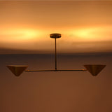 Oslo Modern Double Cone Linear Chandelier creating warm indirect ceiling illumination