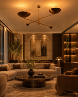 Oslo sculptural chandelier with two wide bowl shades, slim brass arms, and decorative ball accents