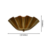 Palermo ruffled brass wall sconce in brass patina finish with fluted scalloped shade and warm upward glow