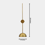 Paris solid brass bowl wall sconce with extended arm shown illuminated with warm downward glow in brass patina finish