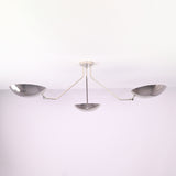 Polished chrome 3 light semi flush mount ceiling light with brass bowl shades, modern minimalist design by Brass Leaf Studio.