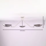 Modern polished chrome ceiling light showing 46 inch width and 15 inch height with three bowl shaped brass shades.