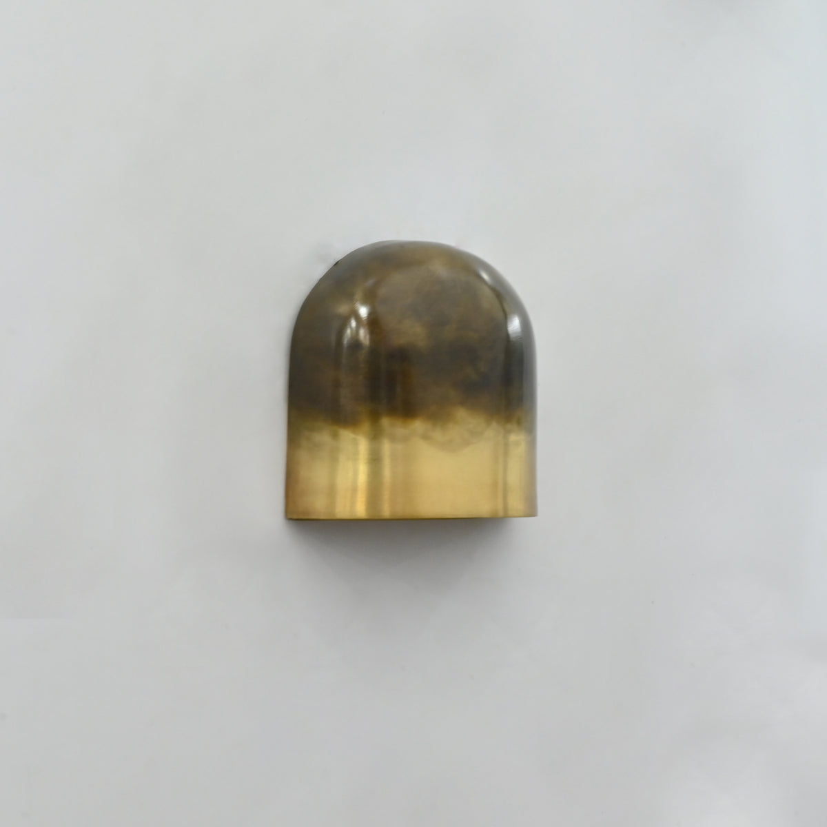 Side view of Prague wall sconce showing rounded dome profile and compact wall-mounted design