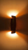 Arcus brass ribbon wall sconce video showing tall curved shade design, warm up-down glow, side ambient lighting, and wall-mounted installation