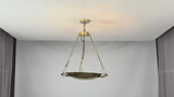 Brass chain bowl chandelier video showing polished brass bowl shade, decorative chain suspension, warm upward glow, and elegant installation in classic interiors