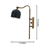 Video showing the Oslo brass patina wall sconce with black brass sheet shade, curved arm, warm downward glow, and elegant installation in bedroom, bathroom, and study interiors