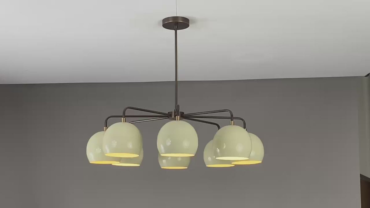 Stylish dual-ring crystal chandelier with a contemporary design, perfect for dining rooms or entryways. Features sleek metal framing and sparkling glass accents for a luxurious touch