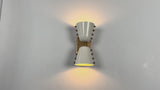 Brass Leaf Studio wall sconce video highlighting the white diabolo shade design, rectangular backplate, and illuminated wall effect