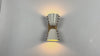 Brass Leaf Studio wall sconce video highlighting the white diabolo shade design, rectangular backplate, and illuminated wall effect